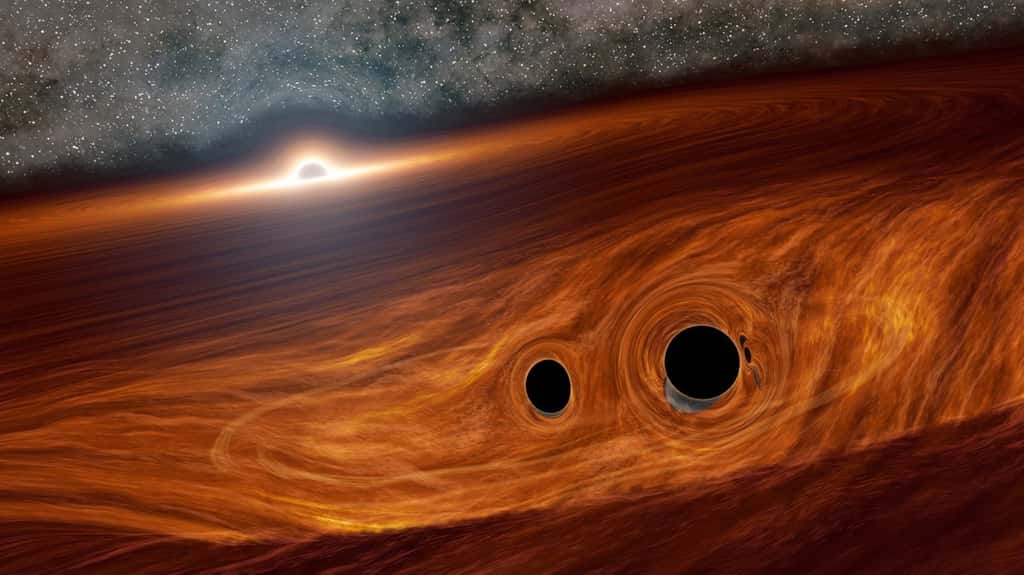 Sur cette image d'artiste, on voit un trou noir binaire dans le disque d'accrétion d'un trou noir supermassif. © Caltech, R. Hurt (IPAC)<br> 