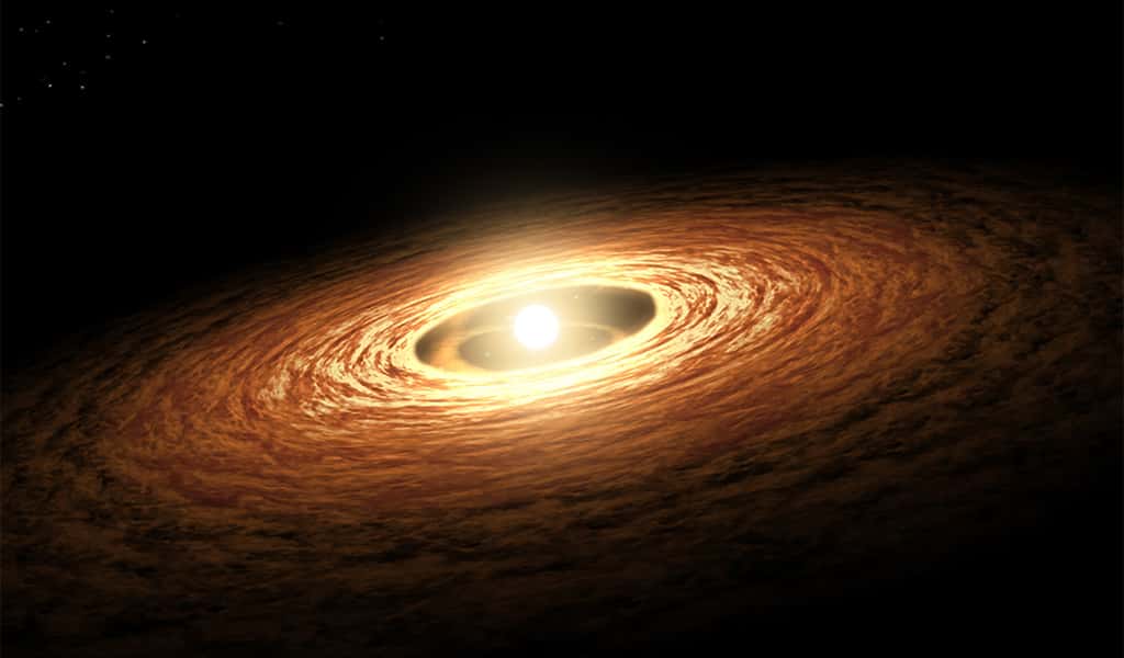 Illustration du disque de gaz entourant une jeune étoile comparable au Soleil. Notre Système solaire devait y ressembler il y a 4,6 milliards d’années. Les planètes, Jupiter en tête, sont sur le point d’émerger. © Nasa, JPL-Caltech, T. Pyle