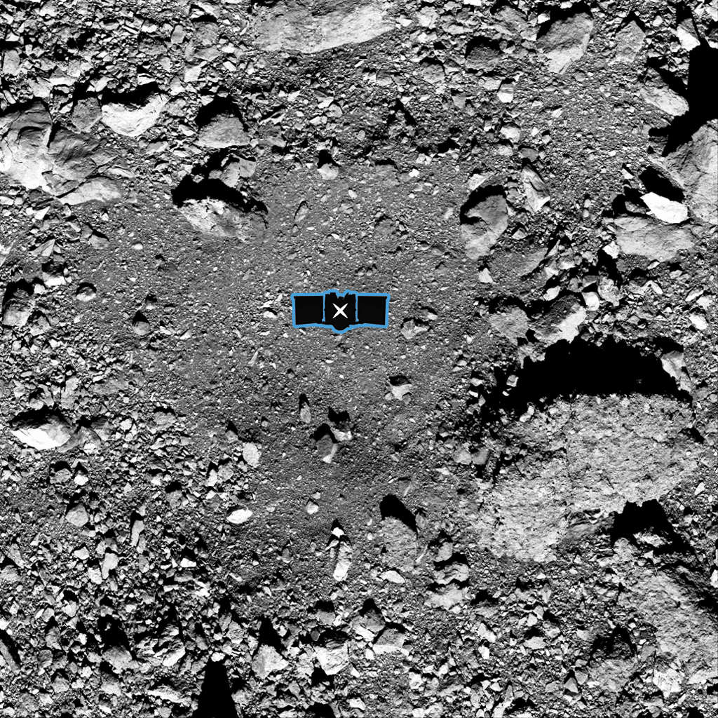 Cette image montre le site d'échantillonnage Nightingale, le principal site de collecte d'échantillons d'Osiris-Rex sur l'astéroïde Bennu. Une représentation graphique d'Osiris-Rex a été ajoutée au centre de l'image pour indiquer l'échelle du site. © NASA/Goddard/University of Arizona