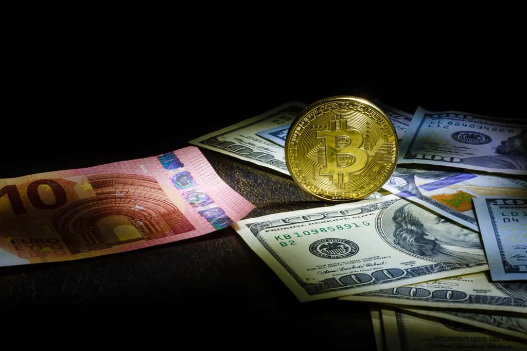  Le Bitcoin, concurrent des monnaies légales ? © Angelov, Adobe Stock