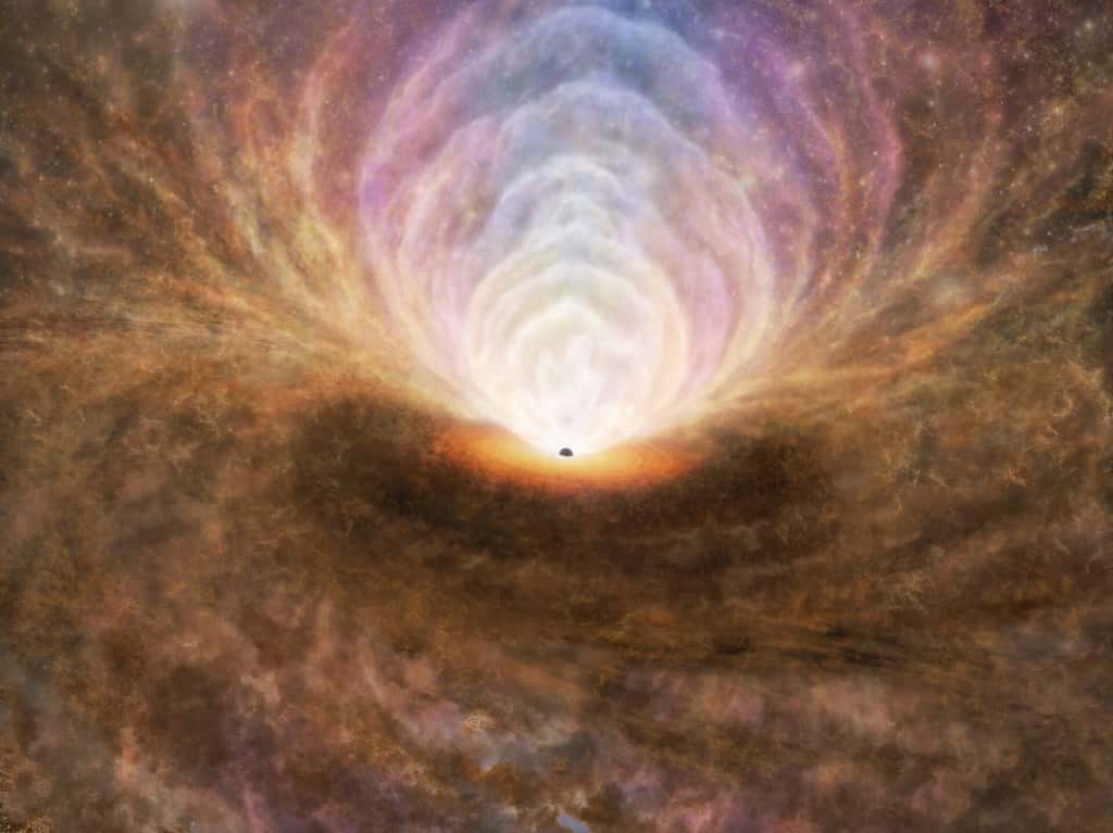 Une illustration de la distribution du milieu interstellaire autour du noyau galactique actif, basée sur les résultats des observations d'Alma. Un gaz moléculaire à haute densité s'écoule de la galaxie vers le trou noir supermassif au centre, le long du plan du disque d'accrétion chauffé entourant le trou noir. La matière accumulée autour du trou noir génère une énorme quantité d’énergie, provoquant la destruction du gaz moléculaire et sa transformation en phase atomique et même en plasma. La plupart de ces gaz sont expulsés dans la direction au-dessus du disque d'accrétion. Néanmoins, la plupart de ces flux retomberont sur le disque, agissant comme une fontaine. © Alma (ESO/NAOJ/NRAO), T. Izumi et al.