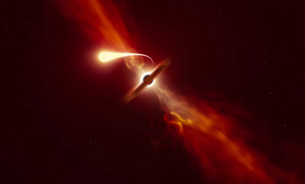Cette illustration montre une étoile (au premier plan) en train de se "spaghettiser" alors qu'elle est aspirée par un trou noir supermassif (en arrière-plan) lors d'un "événement de rupture par effet de marée". © ESO, M. Kornmesser