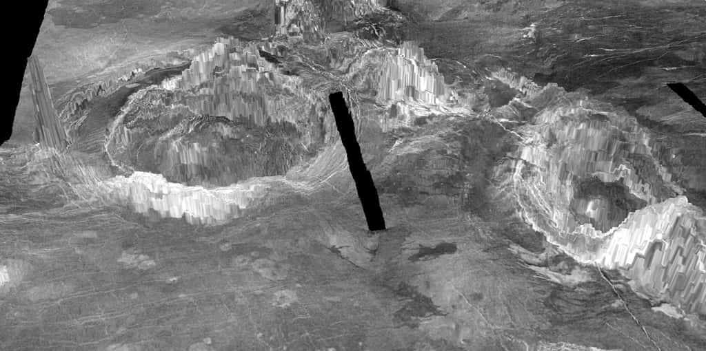 Le rendu 3D ci-dessus montre deux coronaes observées à la surface de Vénus. Les structures en forme d'anneau se forment lorsque des matériaux chauds du plus profond de la planète montent à travers le manteau et éclatent à travers la croûte. Une recherche menée par Laurent Montesi de l'UMD a révélé qu'au moins 37 coronae sur Vénus représentent une activité géologique récente, y compris celle nommée Aramaiti, vue à gauche sur cette image. La ligne noire représente une lacune dans les données. © <em>University of Maryland</em>, Laurent Montési