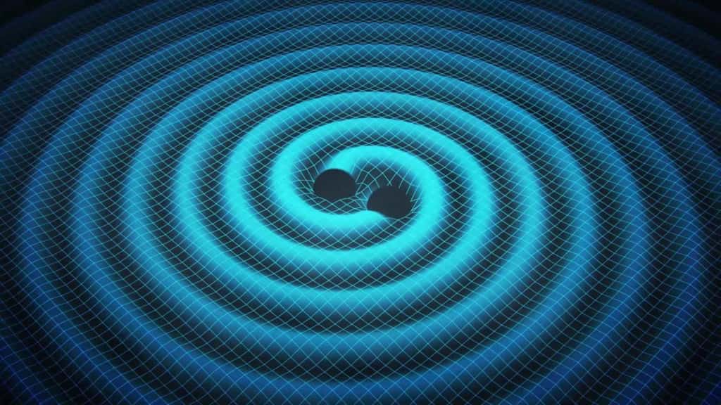 Lorsque deux trous noirs se rapprochent, ils créent des ondulations dans l'espace-temps : des ondes gravitationnelles. © Swinburne Astronomy Production