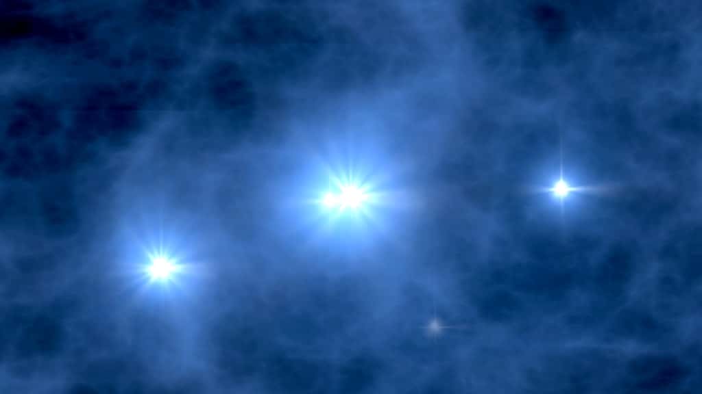 Une vue d'artiste des premières étoiles de l'univers, qui était plus dense et chaud qu'aujourd'hui. Ces astres devaient être particulièrement massifs, avec une centaine de masses solaires, voire des dizaines de milliers selon certains. Leur temps de vie devait donc être inférieur au million d'années. © Nasa, <em>WMap Science Team</em>