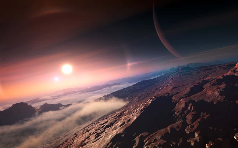 Illustration de la surface d’une exoplanète circumbinaire (autour de deux étoiles). © Eso, UAI