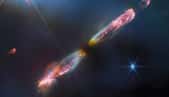 L’image haute résolution dans le proche infrarouge que nous renvoie aujourd’hui le télescope spatial James-Webb d’un objet baptisé Herbig-Haro 211 révèle les détails de jets supersoniques émis par une très jeune étoile, un analogue infantile de notre Soleil. ESA/Webb, NASA, CSA, T. Ray (Dublin Institute for Advanced Studies)