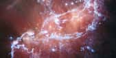 L’amas NGC 346 tel que le télescope spatial James-Webb et son instrument capable de sonder l’infrarouge moyen le dévoilent aujourd’hui. © Nasa, ESA, CSA, N. Habel (JPL), P. Kavanagh (Maynooth University)