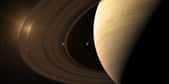 Illustration de Saturne avec le Soleil qui brille à travers ses anneaux. © janez volmajer, Adobe Stock