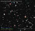 Une vue de l'Extreme Deep Field ou XDF. Sur ce champ très profond qui a été photographié par Hubble, sont cerclés quelques objets avec des décalages spectraux Z parfois importants. © Illustration Z. Levay (STScI)-Nasa, Esa, G. Illingworth, D. Magee, and P. Oesch (University of California, Santa Cruz), R. Bouwens (Leiden University), the HUDF09 Team