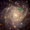 Sur cette image représentant une galaxie spirale cousine de la Voie lactée, on a représenté la région équivalente à celle scrutée par Kepler dans notre Galaxie (en vert). © NOAO, AURA, NSF