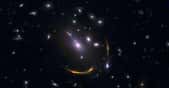 Cette image composite de l’amas de galaxies MACSJ 0138 montre les données du télescope spatial Hubble (Nasa) et du Grand réseau d’antennes millimétrique/submillimétrique de l’Atacama (Alma, Chili) telles qu’observées par les astronomes. Six galaxies massives anciennes s’avèrent avoir manqué d’hydrogène froid, le carburant nécessaire à la formation des étoiles. © LMA (ESO/NAOJ/NRAO), S. Dagnello (NRAO), STScI, K. Whitaker et al