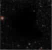 Ici,un nuage de matière noire masque la lumière émise par derrière