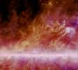 En additionnant les images des poussières galactiques froides déjà données par la mission IRAS, en 1983, à celles données par Planck on obtient cette image, correspondant au cadre rouge de la figure 1. Les tons rougeoyants indiquent des températures jusqu'à 12° au-dessus du zéro absolu et les tons blancs jusqu'à des dizaines de degrés au-dessus du zéro absolu (ce sont les lieux de formation d'étoiles massives). On voit un voisinage du Système solaire avec le plan galactique jusqu'à 500 années-lumière environ. Crédit : ESA-HFI Consortium, IRAS