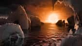 Une vue d’artiste de la surface de Trappist-1f, l’une des 7 exoplanètes en orbite autour de l'étoile Trappist-1, une naine rouge extrêmement froide située à seulement 40 années-lumière de la Terre. © Nasa, JPL-Caltech, T. Pyle (Ipac)
