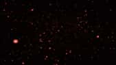 Une vue d'artiste des premières galaxies après le Big Bang observées dans l'infrarouge. © ESA, Hubble, M. Kornmesser &amp; Nasa