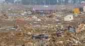 Les catastrophes naturelles nous rappellent que l'humain reste impuissant face à la violence des éléments. En photo, champ de ruines au Japon après le tsunami de 2011. © kariochi, Adobe Stock