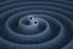Une représentation d'artiste d'ondes gravitationnelles se propageant dans le tissu de l'espace-temps et rayonnées par un couple de trous noirs spiralant l'un vers l'autre. Ce mouvement leur fait perdre de l'énergie, et c'est elle qui s'échappe sous forme d'ondes. © K. Thorne (Caltech)-T. Carnahan (Nasa GSFC)