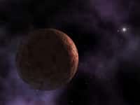 Découverte en 2003, Sedna, qui pourrait prétendre au statut de planète naine, a une orbite extraordinaire, son ellipse l'amenant, en 12.000 ans pour un tour, près de la ceinture de Kuiper puis jusqu'à plus 900 Unités Astronomiques. Cette trajectoire pourrait être due à deux planètes massives circulant bien au-delà de Neptune et Pluton. © Nasa, R. Hurt