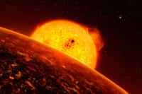 Une vue d'artiste de Corot-7b, une planète rocheuse environ 5 fois plus lourde que la Terre et gravitant à seulement 2,5 millions de km de son étoile (contre 149 millions pour la Terre). L'année y dure seulement 20,4 h. C'est l'une des exoplanètes ayant la plus courte période orbitale connue et elle doit être recouverte par un océan de lave. Selon les observations de Kepler, des exoplanètes encore plus infernales existeraient. © L. Calcada, ESO