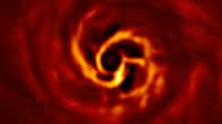 Cette image montre le disque autour de la jeune étoile Aurigae AB, où le Very Large Telescope (VLT) de l'ESO a repéré des signes de la naissance d'une planète. Près du centre de l'image, dans la région intérieure du disque, on voit la « torsion » (en jaune très brillant) qui, selon les scientifiques, marque l'endroit où une planète est en train de se former. L'image a été obtenue avec l'instrument Sphere du VLT en lumière polarisée. © ESO/Boccaletti et al.