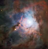 La toile de gaz et de poussière de NGC 2023 luit de la lumière de la jeune étoile HD 37903. © ESO