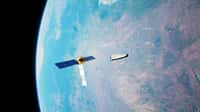 La start-up Space Cargo Unlimited disposera en 2025 d'un véhicule spatial automatisé réutilisable sans astronaute à bord, développé par Thales Alenia Space. Sur cette vue d'artiste, on voit le cargo spatial REV1 s'arrimer au module de service. © Space Cargo Unlimited