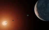 L'étoile Trappist-1 est-elle trop vieille pour abriter de la vie ? Ici, illustration du système de Trappist-1. Sept planètes rocheuses gravitent autour de cette naine rouge. Trois d’entre elles sont dans la zone habitable. © Nasa, JPL-Caltech