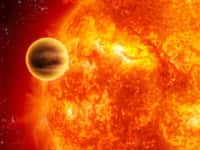 Vue d'artiste d'une géante gazeuse passant à une faible distance de son étoile. Dans la réalité, les instruments de précision détectent la très légère baisse de luminosité de l'étoile causée par cette minuscule éclipse partielle. C'est la méthode dite du transit pour détecter des exoplanètes. Kepler et Corot en sont les spécialistes incontestés. © Nasa