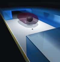 Schéma du tunnel dans lequel l'échantillon (l'objet violet) est emporté, passant au-dessus des trous (points noirs) qui surmontent les éléments photosensibles. © Changhuei Yang