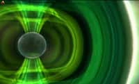 Une représentation stylisée du champ magnétique de la Terre qui évite aux particules du vent solaire de pénétrer dans l'atmosphère (si ce n'est dans les régions polaires pour y dessiner des aurores). © Discovery Science