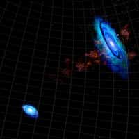 Cette image révèle l'écharpe d'hydrogène gazeux décelée entre les galaxies d'Andromède et du Triangle, preuve d'une rencontre très ancienne. © Bill Saxton/NRAO/AUI/NSF 