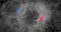 Des astronomes de l’université de Harvard ont découvert que deux nuages moléculaires bien connus des chercheurs, le nuage de Persée — ici en rouge — et le nuage du Taureau — ici en bleu — se situent à la surface d’une cavité, d’une sorte de trou de matière béant. De quoi éclairer d’un jour nouveau le processus de formation des étoiles. © Jasen Lux Chambers, Centre d’astrophysique de l’université de Harvard
