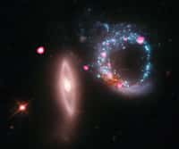 Cette image composite de l'anneau lumineux associé à Arp 147 superpose une vue prise dans le visible par le télescope Hubble et celle en rayons X de l'observatoire Chandra. © X-ray: Nasa/CXC/MIT/S.Rappaport et al, Optique : Nasa/STScI
