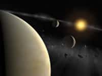 Vue d'artiste des exoplanètes de l'étoile HD69830. La planète la plus proche de son étoile (10 masses terrestres environ) accomplit sa révolution orbitale en neuf jours, la médiane (12 masses) en 31 jours et celle qui gravite à l'extérieur du système (18