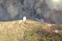 Dimanche 13 janvier 2013, le feu était aux portes de l'observatoire astronomique australien de Siding Spring, qui a dû être évacué. © Rural Fire Service, AFP