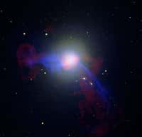 M-87 dans toute sa splendeur. Champ horizontal de l’image : 11 arcmin. Position : RA 12h 30m 49.40s - Dec +12° 23' 28.00". Crédit : NASA/CXC/CfA/W, Hubble Heritage Team