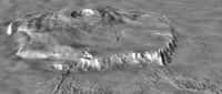 En combinant les données de l'altimètre laser de la sonde Mars Global Surveyor (MOLA) et les images obtenues par les sondes Viking, les scientifiques ont reconstitué cette vue d'Olympus Mons. Pour mieux montrer le relief de l'édifice, ils ont multiplié par 10 l'échelle verticale. Crédit Nasa
