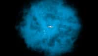Un halo d’hydrogène entoure notre Voie lactée – ici en vue d’artiste – et les autres galaxies de notre Univers. Des chercheurs de l’université de Californie à Berkeley (UC Berkeley, États-Unis) montrent aujourd’hui qu’il est suffisamment étendu pour résoudre à lui seul le problème de la masse baryonique manquante de l’Univers © Nasa, CXC, M.Weiss ; Nasa, CXC, Ohio State, A Gupta et al.