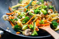 La cuisine du restaurant Spyce repose sur ses sept woks et sur un système de distribution des ingrédients robotisé. © asife, Fotolia