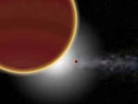 Vue d’artiste du système β Pictoris. Au moins deux planètes géantes, âgées de 23 millions d’années tout au plus, orbitent autour de l’étoile (non visible) : β Pictoris c, la plus proche et qui vient d’être découverte, et β Pictoris b, plus éloignée. Le disque de poussières et de gaz est visible à l’arrière-plan. © P Rubini / AM Lagrange