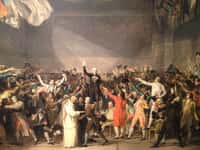 Le 20 juin 1789, des députés prononcent le serment du Jeu de paume et promettent de ne pas se séparer avant qu'une Constitution ne soit adoptée. © Jacques-Louis David, Wikimedia Commons, Domaine public
