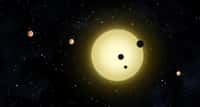 Illustration des planètes en transit devant l’étoile Kepler-11. © Nasa