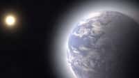 Représentation artistique d'une exoplanète dont la glace d'eau à la surface se vaporise de plus en plus et forme une atmosphère lors de son approche de l'étoile centrale du système planétaire. Ce processus augmente le rayon planétaire mesuré par rapport à la valeur qu'aurait la planète à son lieu d'origine. © Thomas Müller (MPIA)