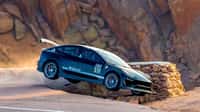La Tesla Model 3 au moment de son crash durant les essais libres de Pikes Peak. © Unplugged Performance, Larry Chen