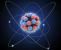 Les noyaux des atomes contiennent des nucléons (bleus et rouges sur cette image d'artiste), c'est-à-dire des protons et des neutrons. Il est possible de fabriquer sur Terre des noyaux plus lourds que ceux de l'uranium avec 92 protons et des centaines de neutrons pour ses isotopes en faisant fusionner des noyaux lourds, par exemple avec des faisceaux d'ions calcium bombardant d'autres éléments dans une cible au repos. © Mopic, Shutterstock