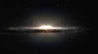 Cette vue d'artiste montre ce à quoi notre galaxie, la Voie lactée, ressemblerait, si nous l'observions depuis le dessus et sous un autre angle que celui sous lequel nous l'apercevons depuis la Terre. Le bulbe central apparaît sous la forme d'une cacahuète constituée d'étoiles rougeoyantes et les bras spiraux ainsi que les nuages de poussière associés forment une bande étroite. © Eso/Nasa/JPL-Caltech/M. Kornmesser/R. Hurt