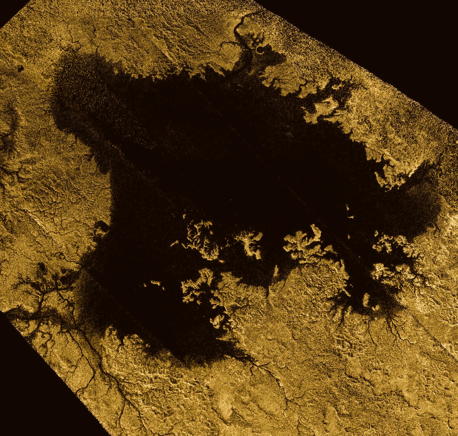 Ligeia&nbsp;Mare, montré ici dans une image en fausses couleurs obtenue en combinant des observations du radar de Cassini, est le deuxième grand lac sur Titan. Il mesure environ 420 km sur 350 km. Il est rempli d'hydrocarbures légers liquides, tels que l'éthane et le méthane. On trouvait déjà des traces de ces hydrocarbures, ainsi que leurs alcènes et alcynes dans l’atmosphère de Titan. Jusqu’à récemment, le propène n’avait pas été détecté dans cette atmosphère alors que c’était le cas du propane et du propyne. © Nasa, JPL-Caltech, ASI, Cornell