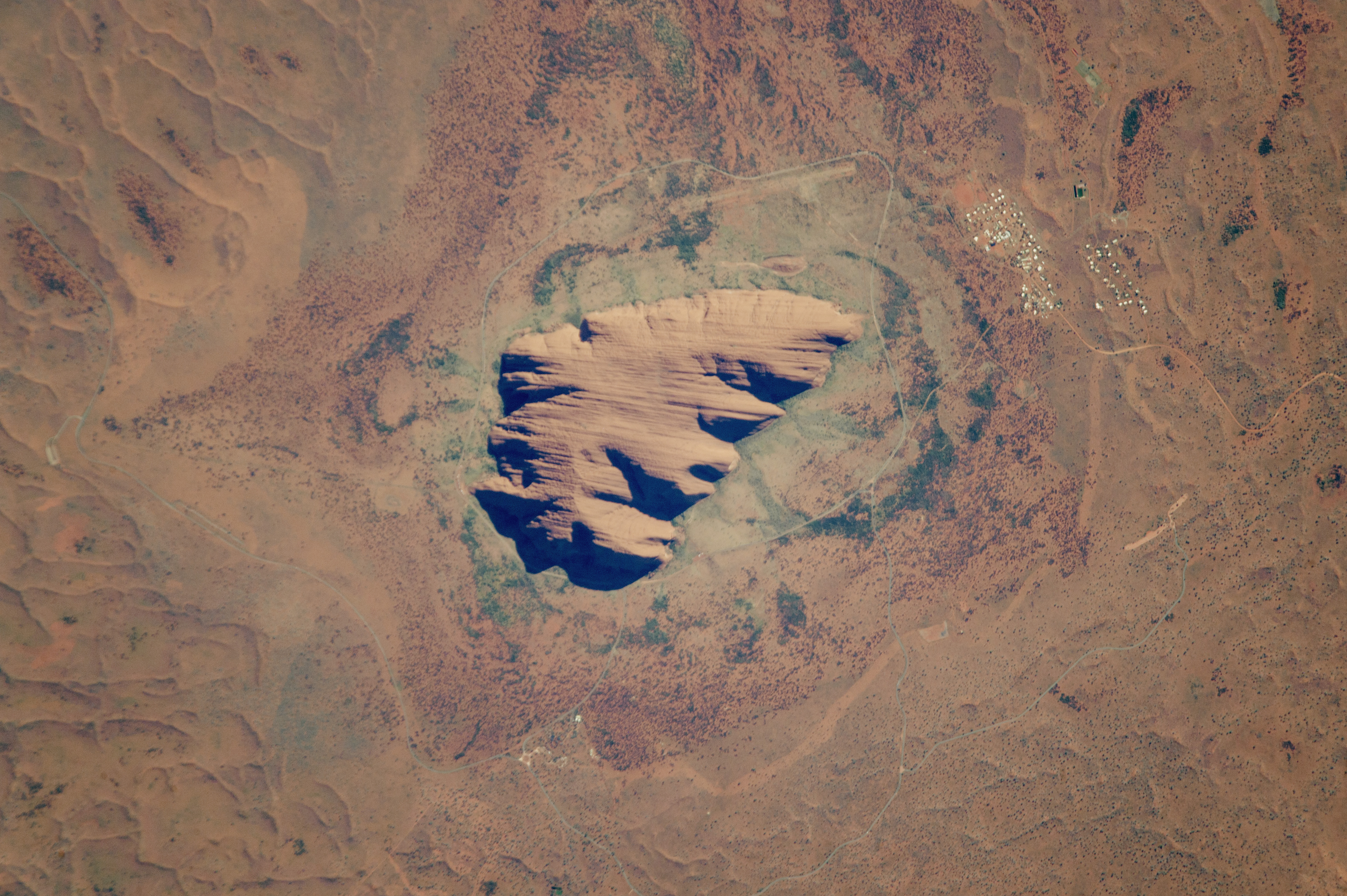 Le site d'Uluru a été classé au patrimoine mondial de l'Unesco en 1994 afin de préserver la culture aborigène. © Nasa