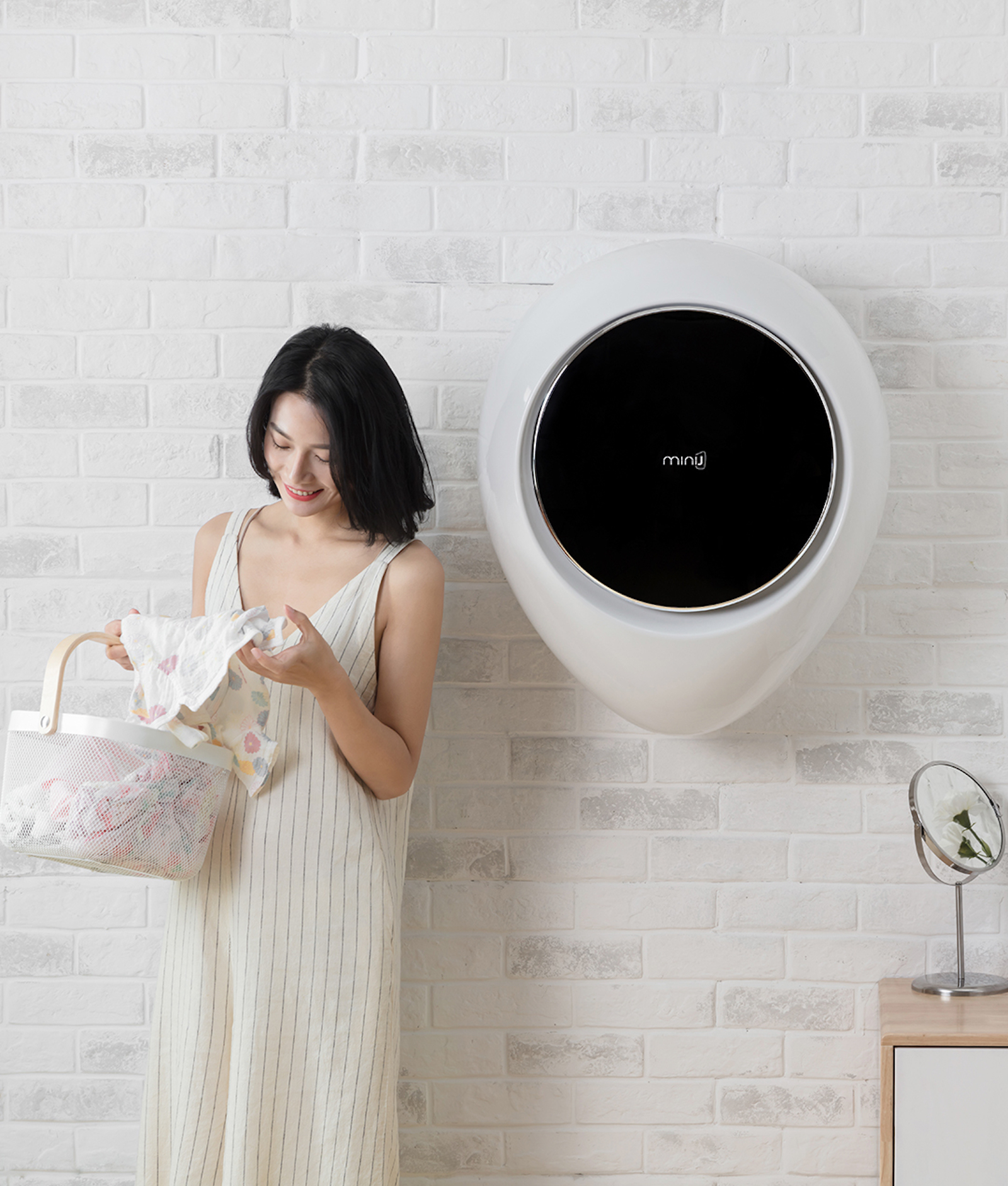 La machine à laver murale MiniJ, de Xiaomi, a une capacité de 3 kg. © youpin.mi.com